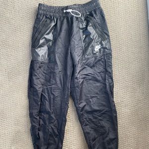 black nike joggers- windbreaker material